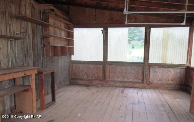 2817 Jackson Road Stroudsburg, PA 18360 - Photo 22 of 22 a view of an empty room with wooden floor and a window