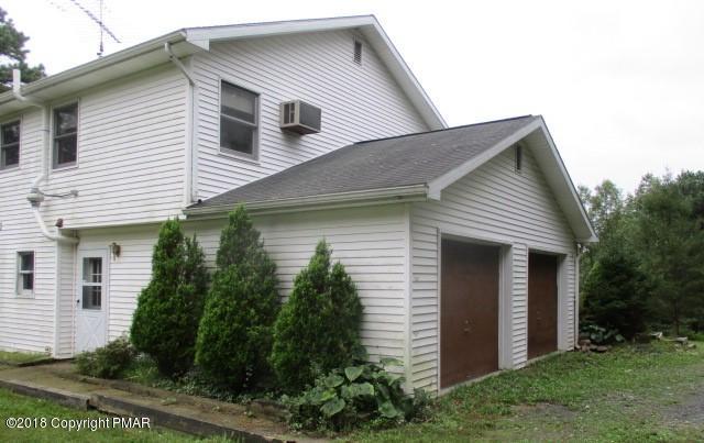 2817 Jackson Road Stroudsburg, PA 18360 - Photo 3 of 22 a front view of house with a garden
