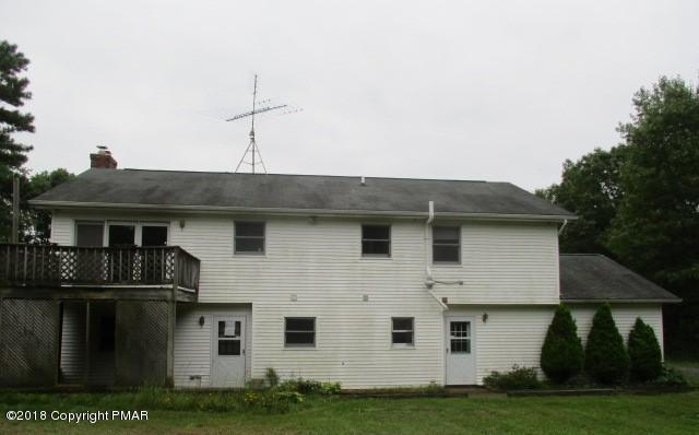 2817 Jackson Road Stroudsburg, PA 18360 - Photo 4 of 22 a front view of a house with a yard
