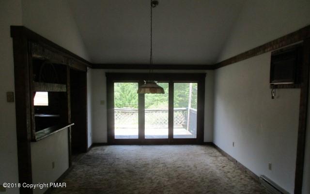 2817 Jackson Road Stroudsburg, PA 18360 - Photo 9 of 22 a view of an empty room with a fireplace and a window