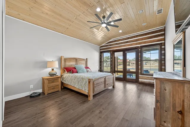 a bedroom with furniture and a window