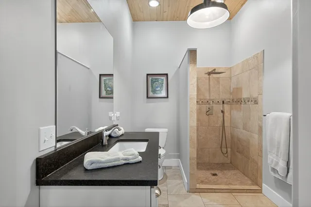 a bathroom with a sink and a toilet