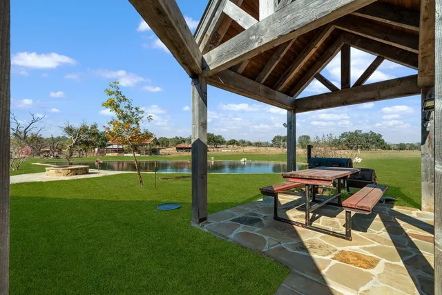 a view of a golf course with a lake