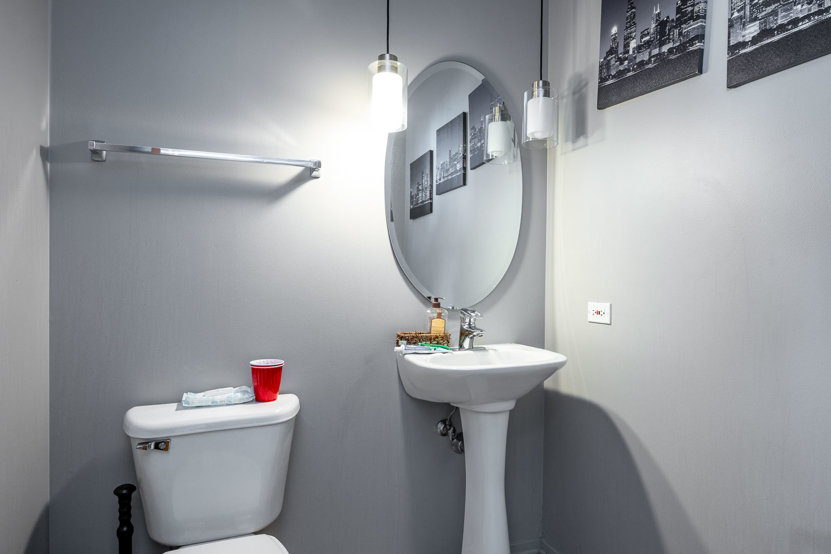 700 West Van Buren Street, Unit PH3 Chicago, IL 60607 - Photo 12 of 20 a bathroom with a toilet sink and mirror