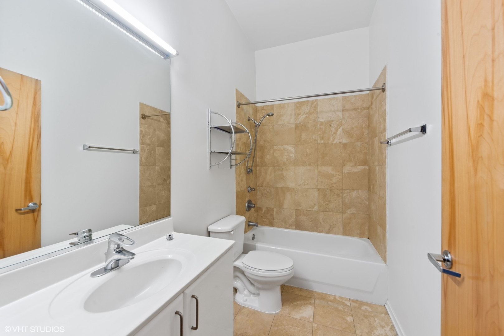 700 West Van Buren Street, Unit PH3 Chicago, IL 60607 - Photo 7 of 20 a bathroom with a sink a toilet and shower