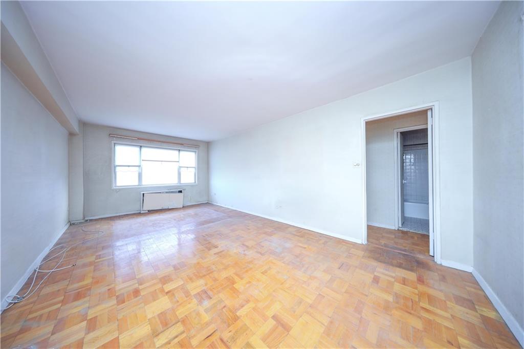 8901 Shore Road, Unit 7B Brooklyn, NY 11209 - Photo 6 of 12 a view of empty room with window