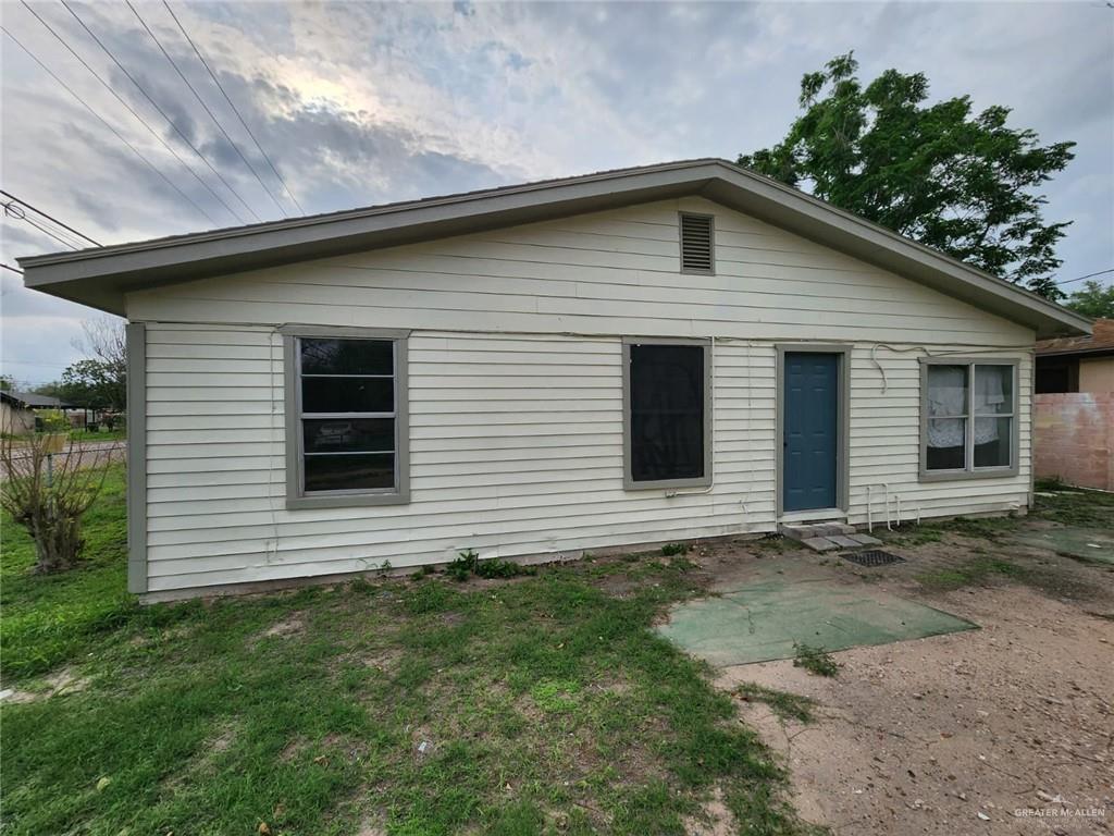 2002 Thornton Street Mission, TX 78572 - Photo 19 of 20 a front view of a house with garden