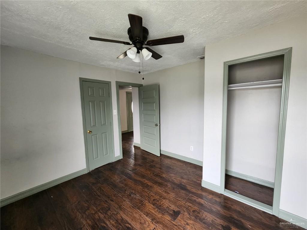 2002 Thornton Street Mission, TX 78572 - Photo 8 of 20 a view of an empty room and wooden floor
