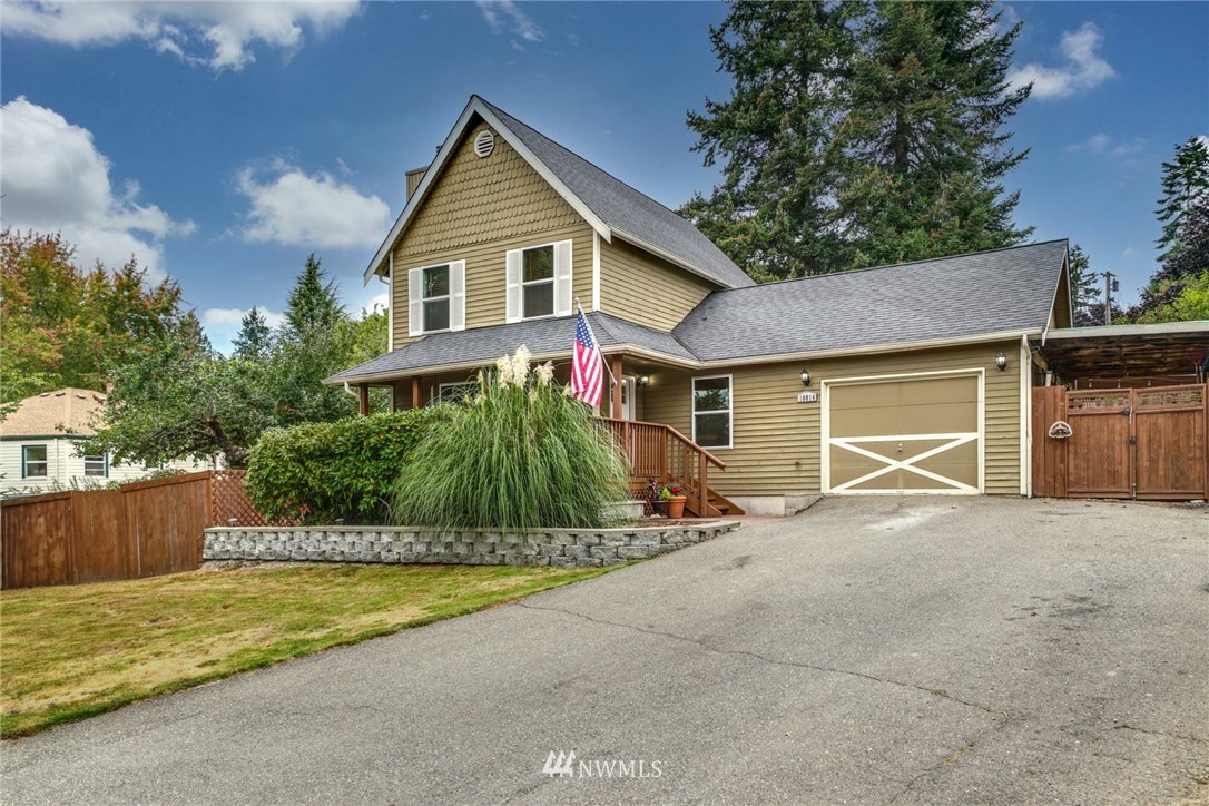 a view of a house with a outdoor space and porch
