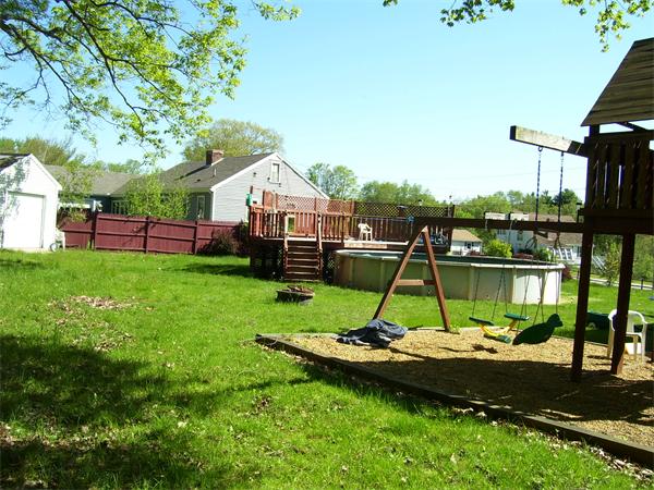 78 Blood Road Charlton, MA 01507 - Photo 14 of 25 a view of a house with pool and a yard