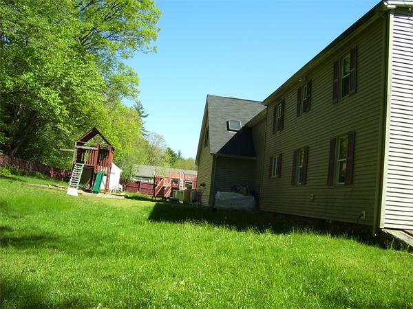 78 Blood Road Charlton, MA 01507 - Photo 17 of 25 a view of a house with a backyard