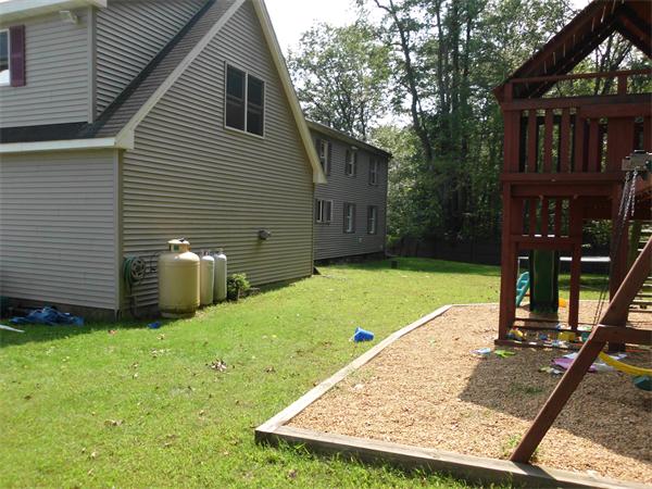 78 Blood Road Charlton, MA 01507 - Photo 2 of 25 a view of a backyard with a garden