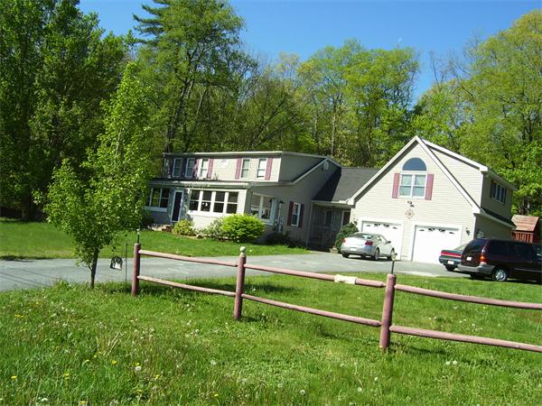 78 Blood Road Charlton, MA 01507 - Photo 3 of 25 a front view of a house with a yard