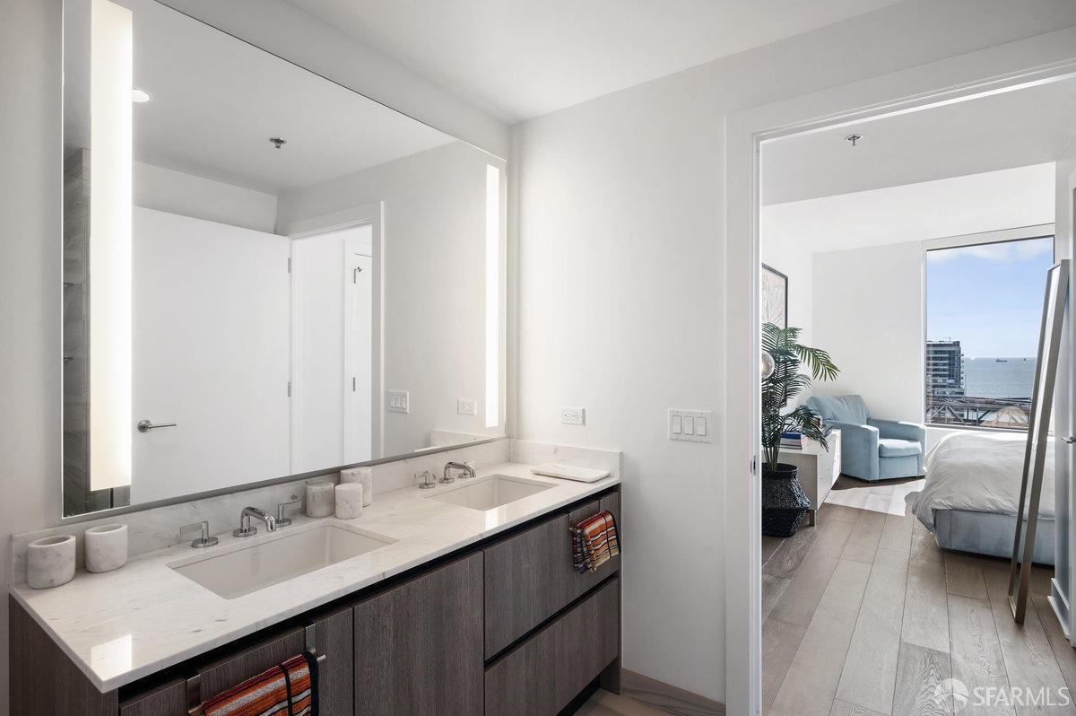 201 Folsom Street, Unit 22F San Francisco, CA 94105 - Photo 20 of 53 a bathroom with a sink double vanity and a mirror