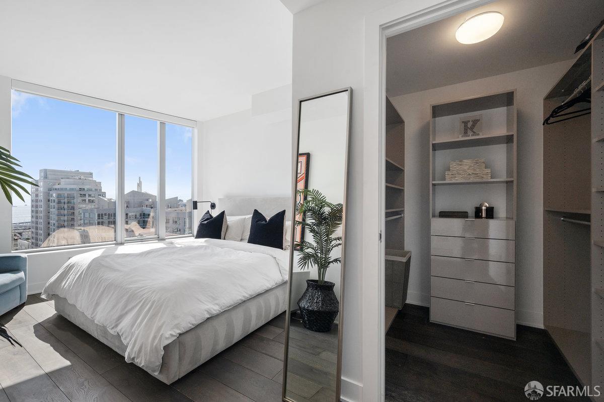201 Folsom Street, Unit 22F San Francisco, CA 94105 - Photo 21 of 53 a bedroom with a bed and closet