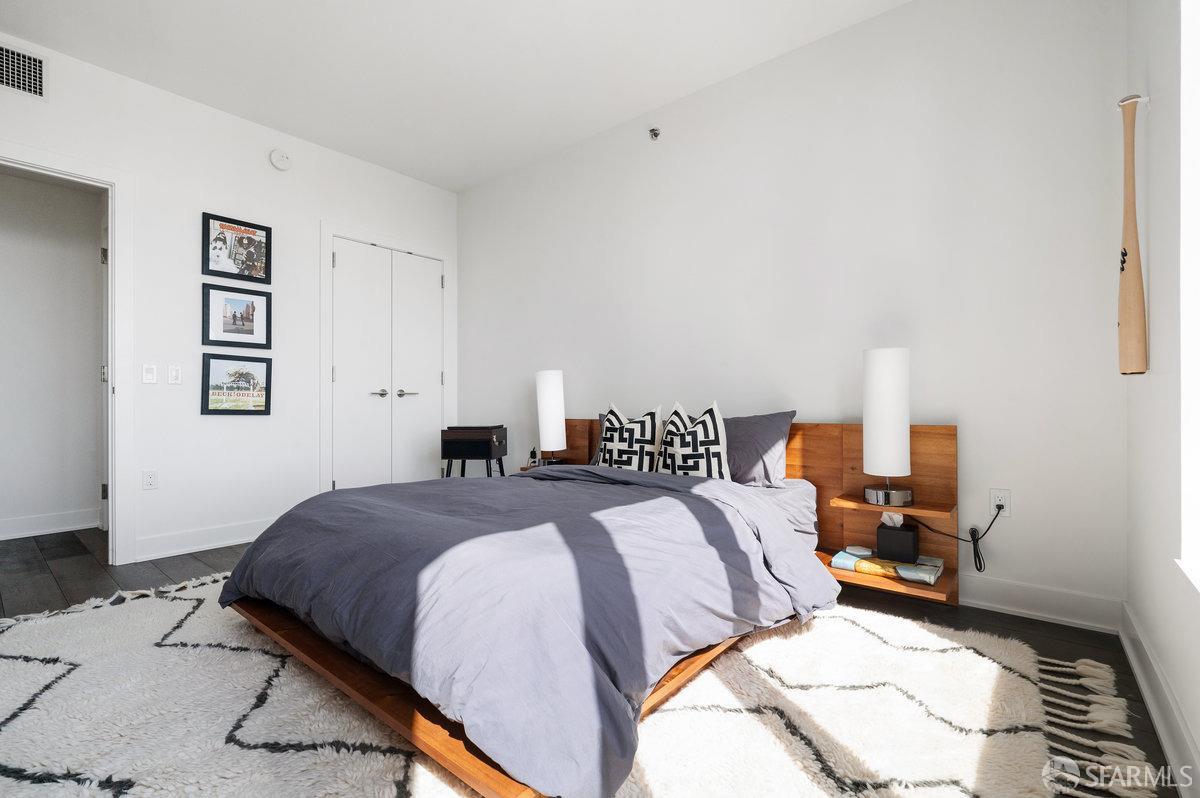 201 Folsom Street, Unit 22F San Francisco, CA 94105 - Photo 27 of 53 a bedroom with a bed and closet
