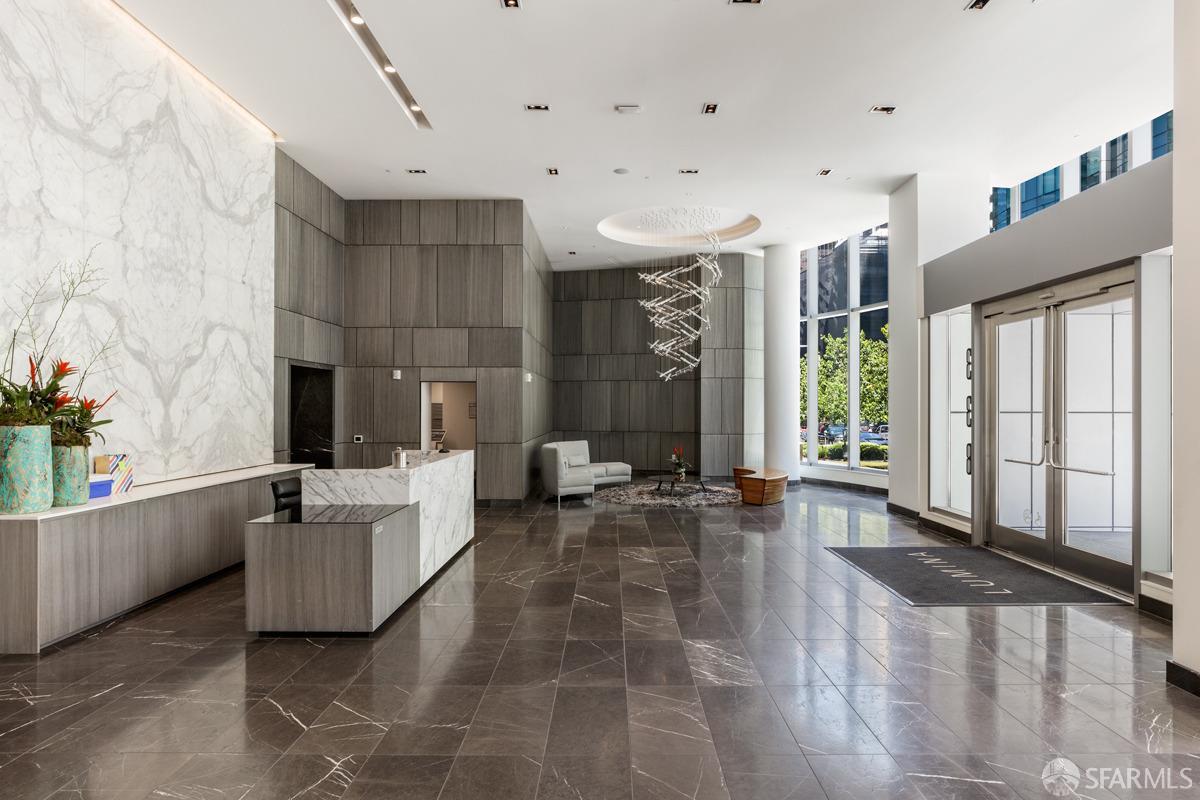 201 Folsom Street, Unit 22F San Francisco, CA 94105 - Photo 31 of 53 a living room with furniture and a large window