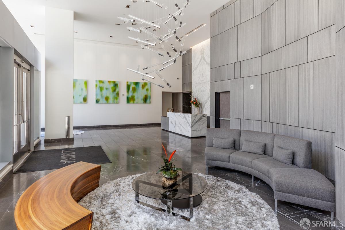 201 Folsom Street, Unit 22F San Francisco, CA 94105 - Photo 32 of 53 a living room with furniture and a fireplace