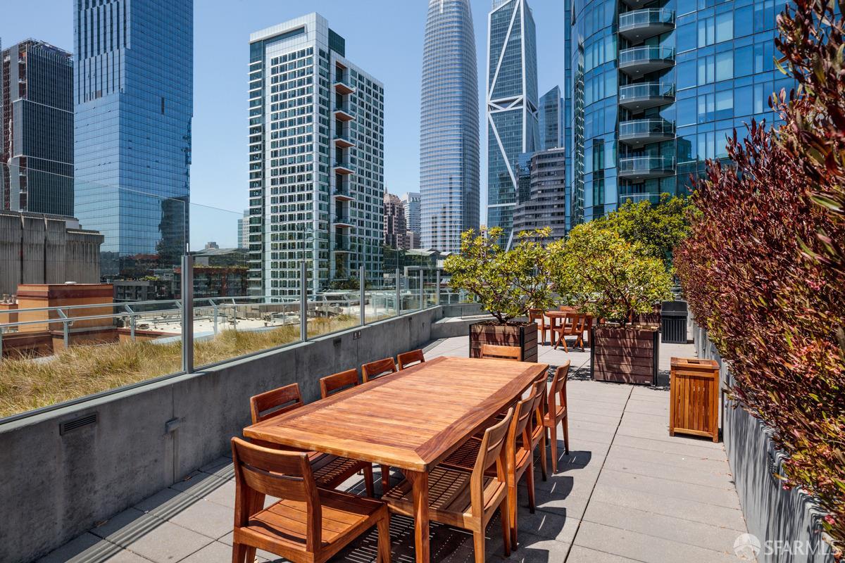 201 Folsom Street, Unit 22F San Francisco, CA 94105 - Photo 35 of 53 a outdoor dining space with furniture and city view