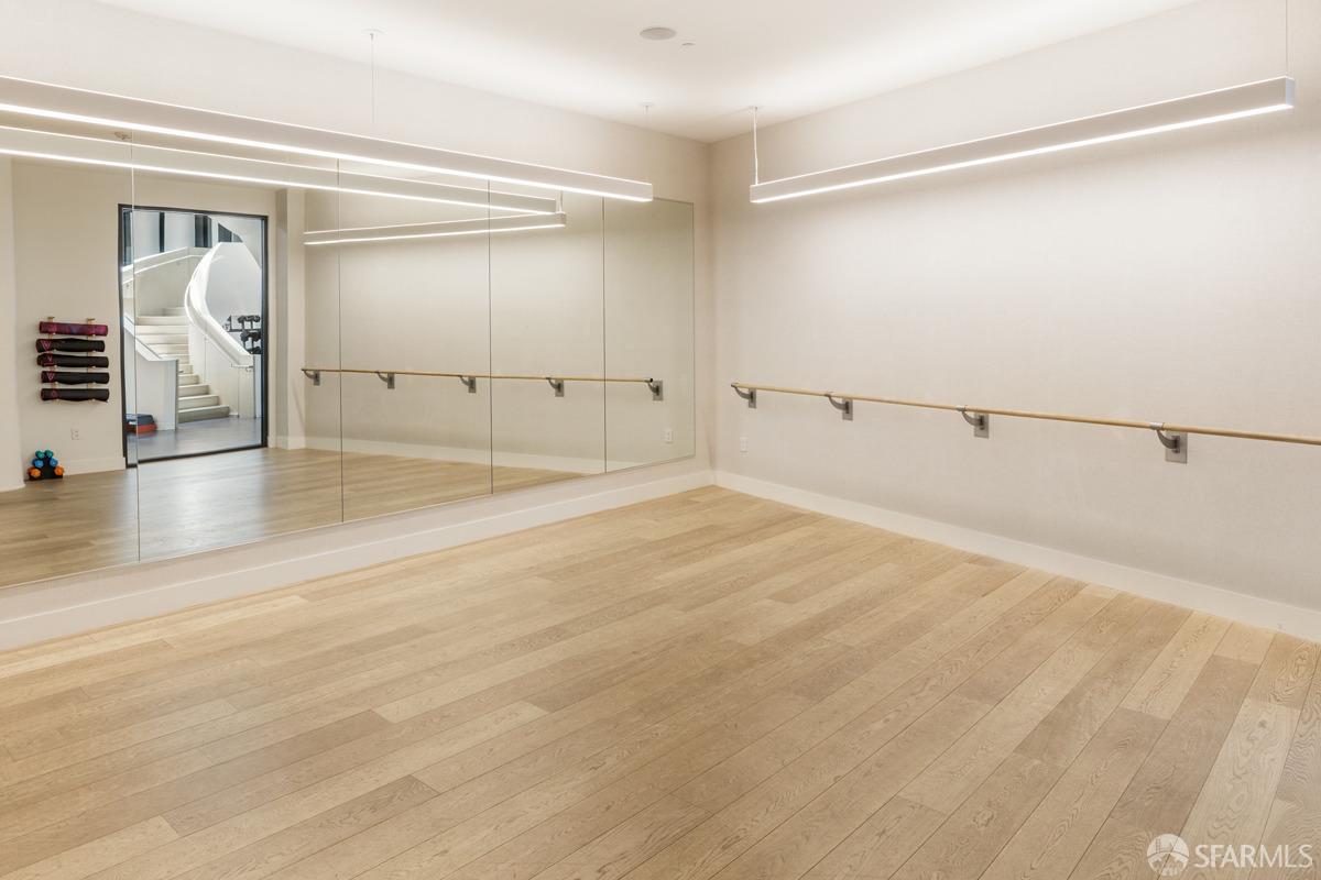 201 Folsom Street, Unit 22F San Francisco, CA 94105 - Photo 41 of 53 a view of empty room with wooden floor
