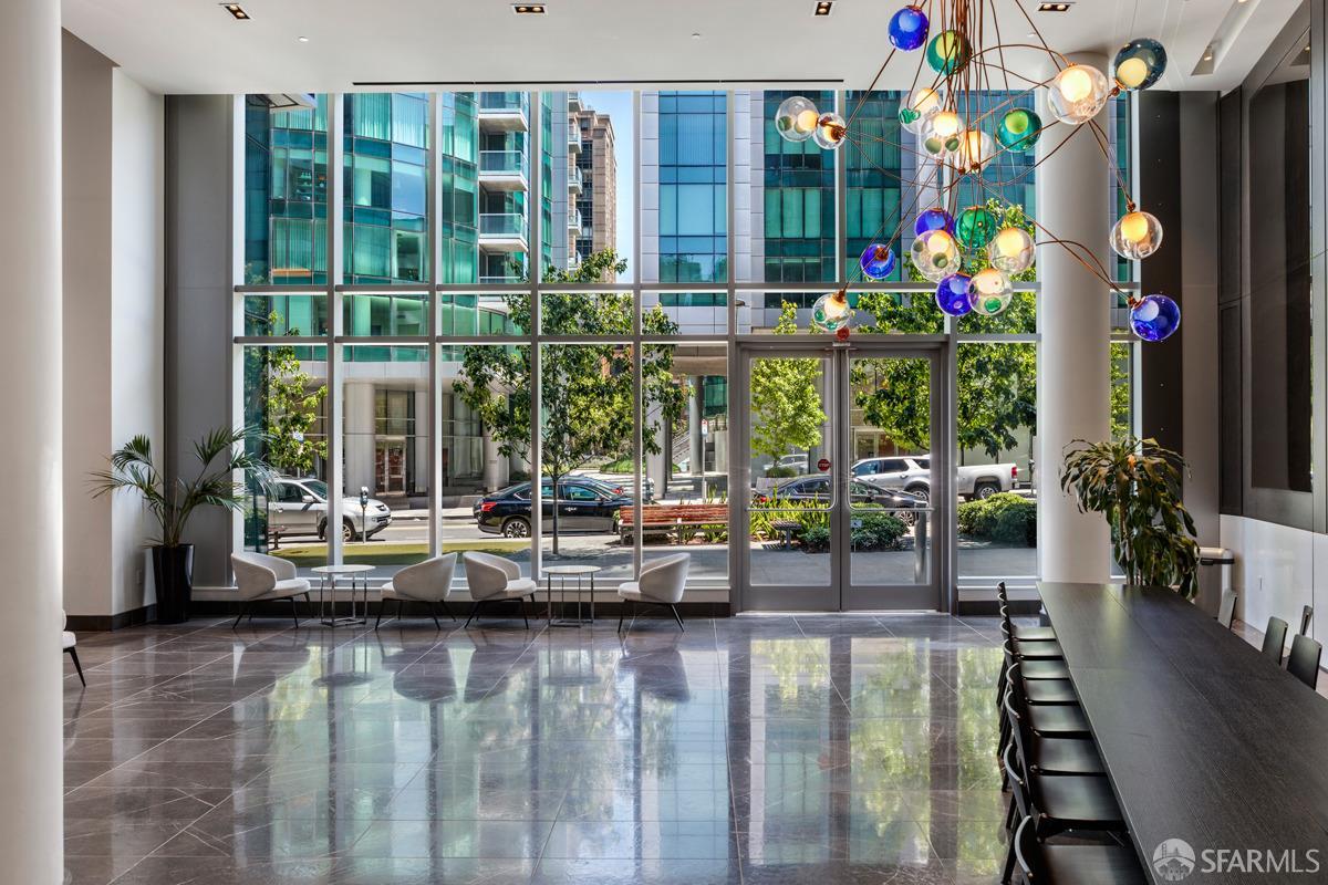 201 Folsom Street, Unit 22F San Francisco, CA 94105 - Photo 45 of 53 a view of swimming pool with a dining table and chairs
