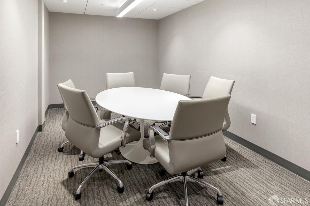 201 Folsom Street, Unit 22F San Francisco, CA 94105 - Photo 48 of 53 a view of a dining room with furniture and wooden floor
