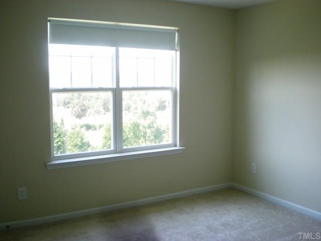 4832 Sir Duncan Way Raleigh, NC 27612 - Photo 8 of 10 Spacious second bedroom.