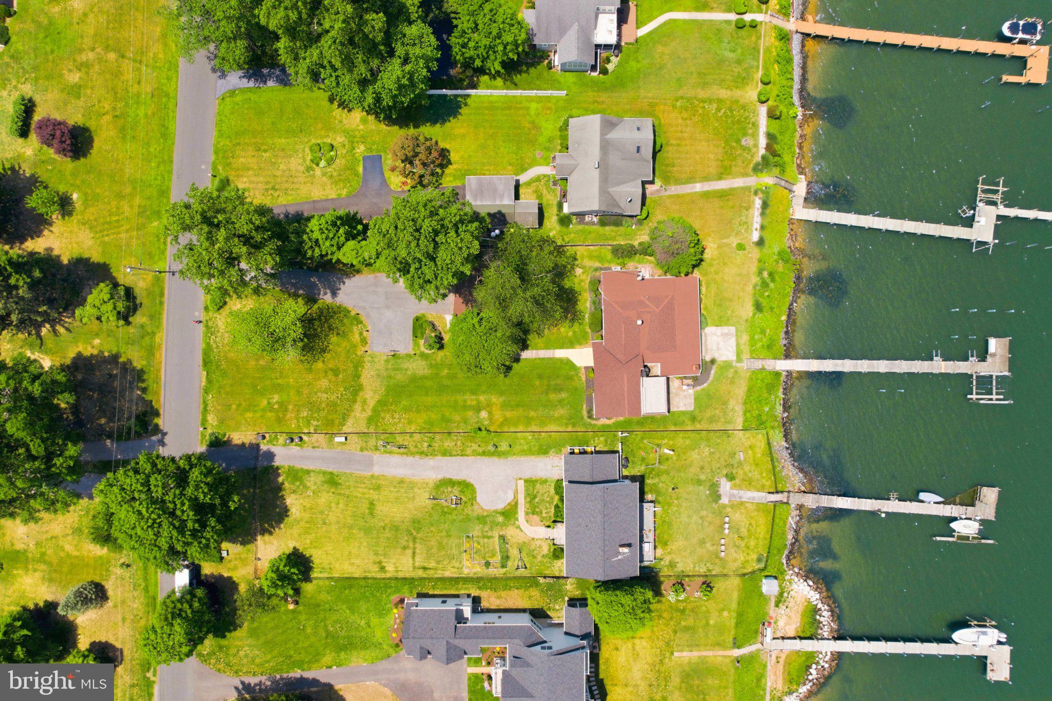 1100 River Bay Road Annapolis, MD 21409 - Photo 65 of 67 an aerial view of a house with a swimming pool
