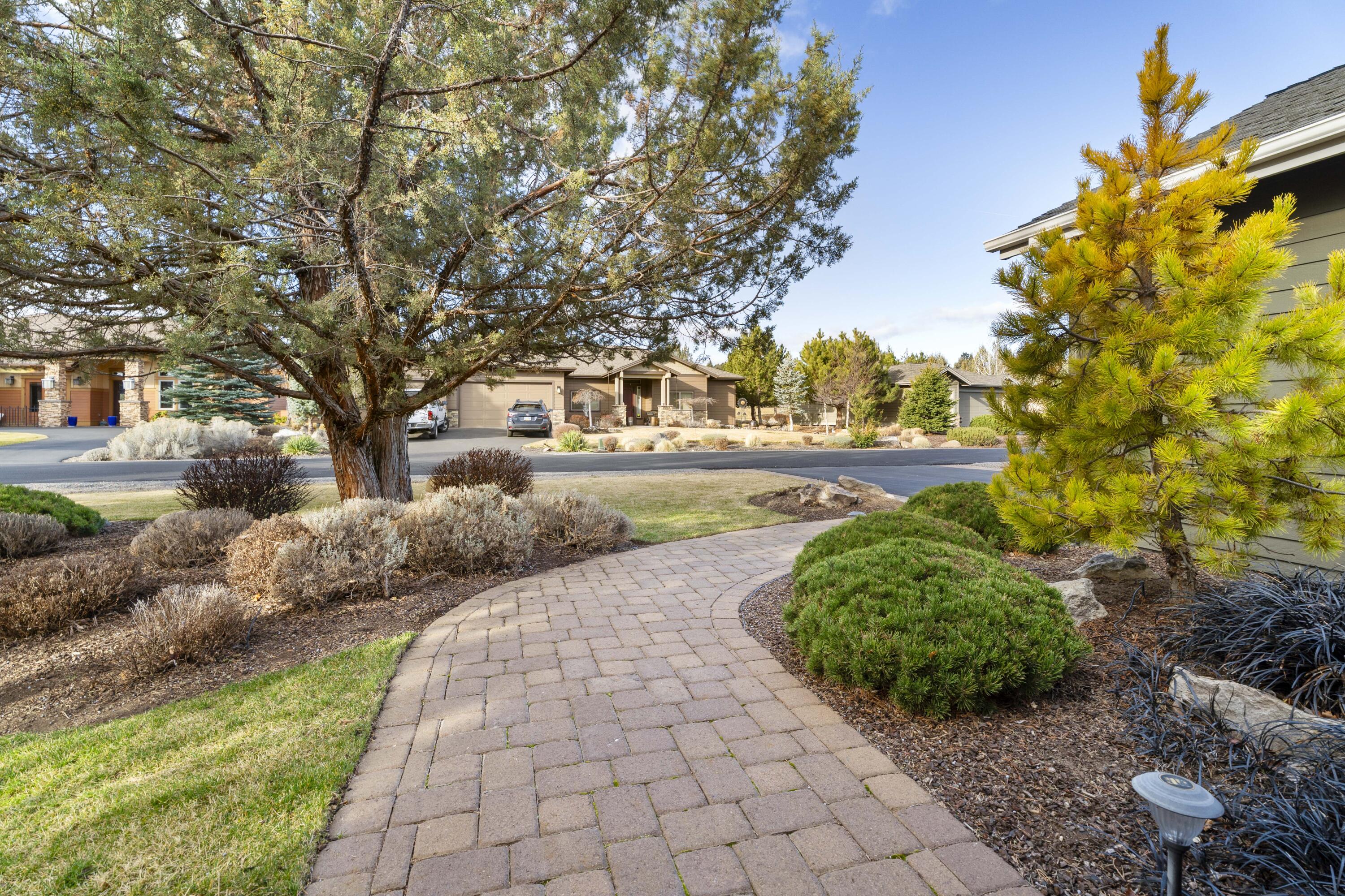 784 Ribbon Falls Road Redmond, OR 97756 - Photo 8 of 79 a pathway of a yard