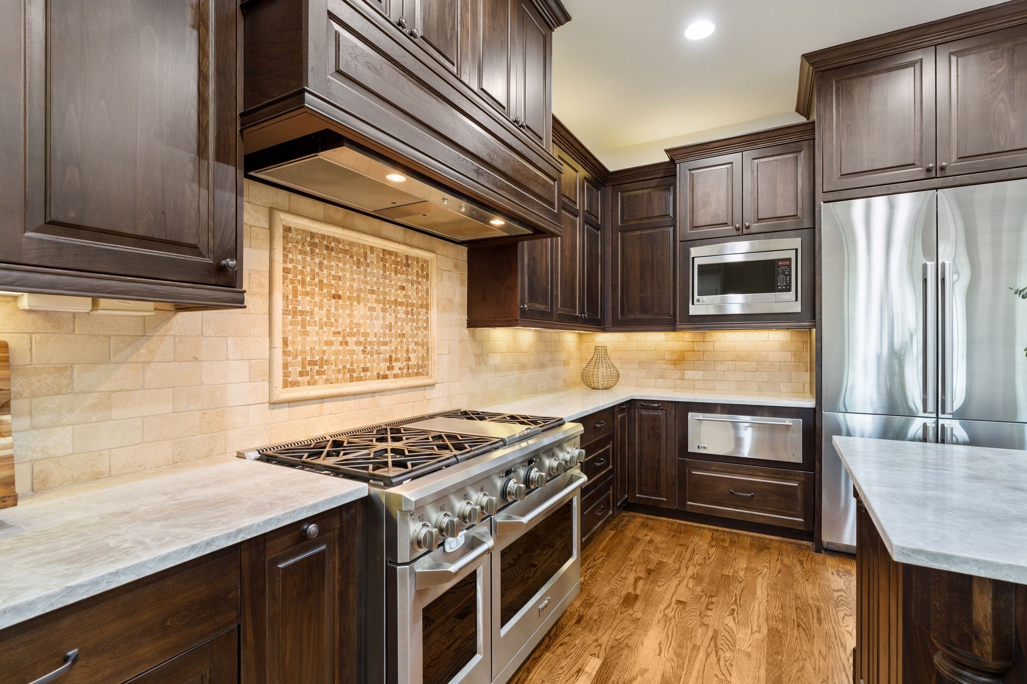 1418 Du Barry Lane Houston, TX 77018 - Photo 13 of 45 a kitchen with stainless steel appliances granite countertop a stove a sink and a refrigerator