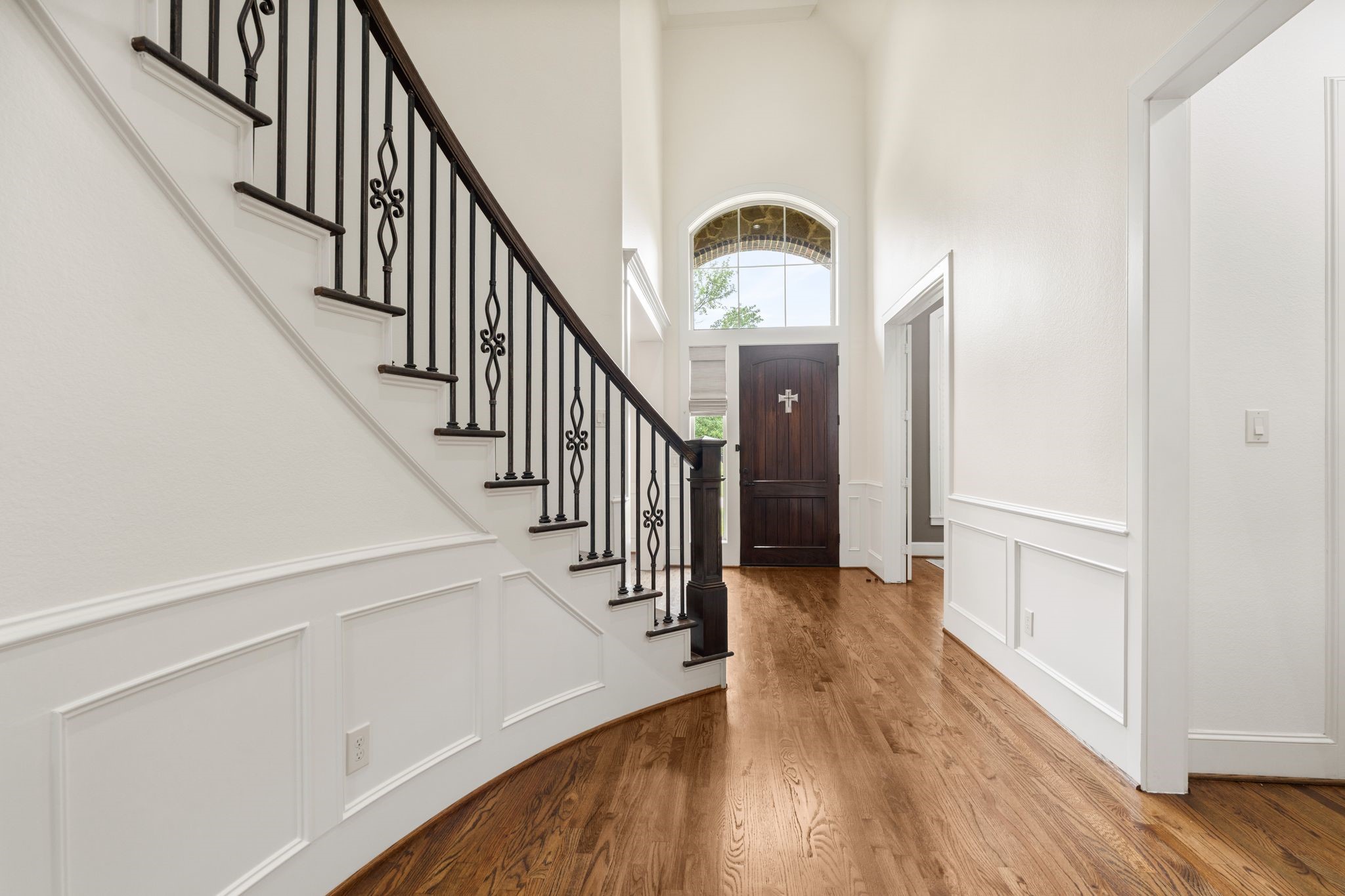 1418 Du Barry Lane Houston, TX 77018 - Photo 2 of 45 a view of a hallway with wooden floor and staircase