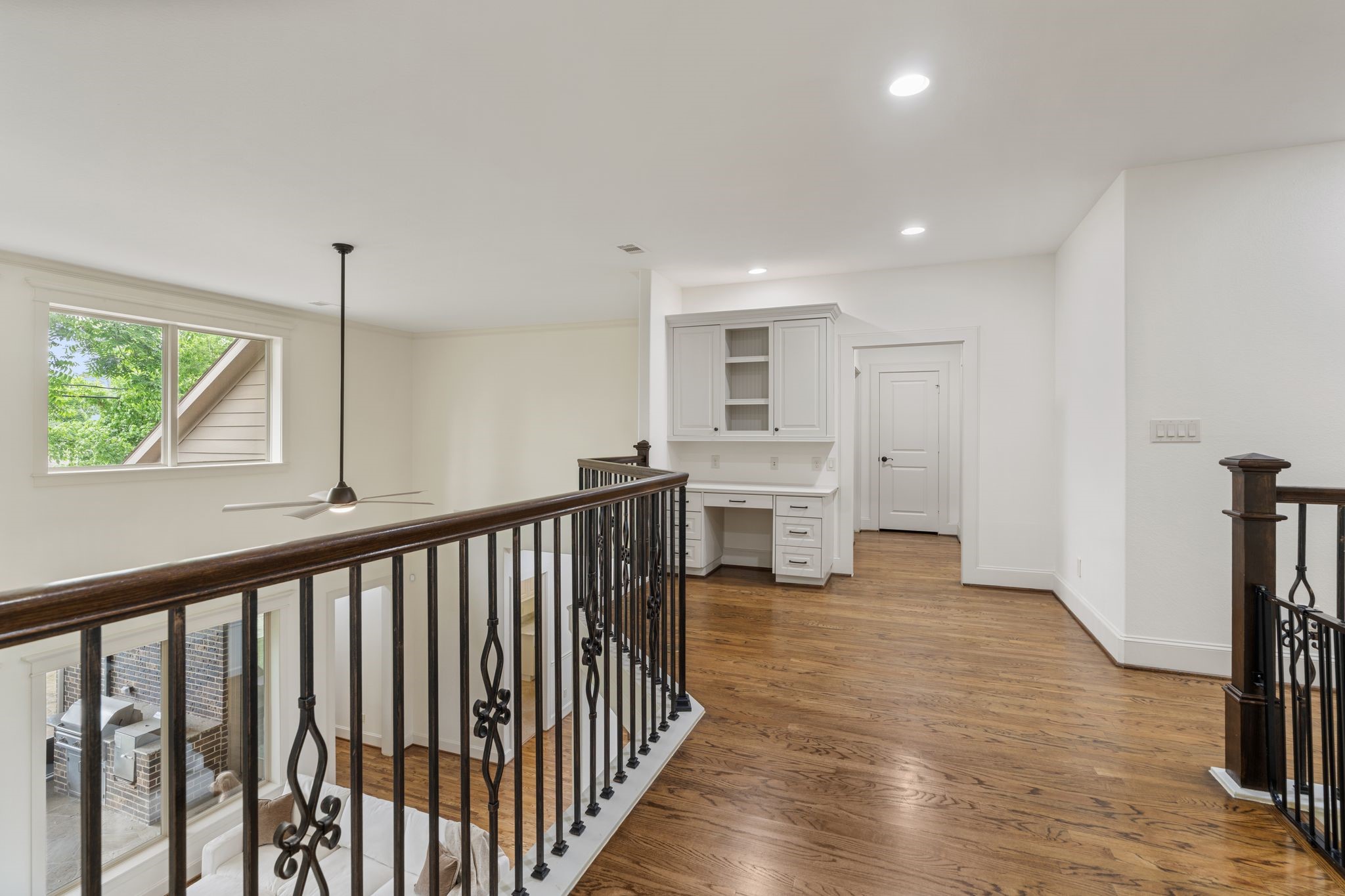 1418 Du Barry Lane Houston, TX 77018 - Photo 27 of 45 a view of a kitchen with wooden floor and stairs