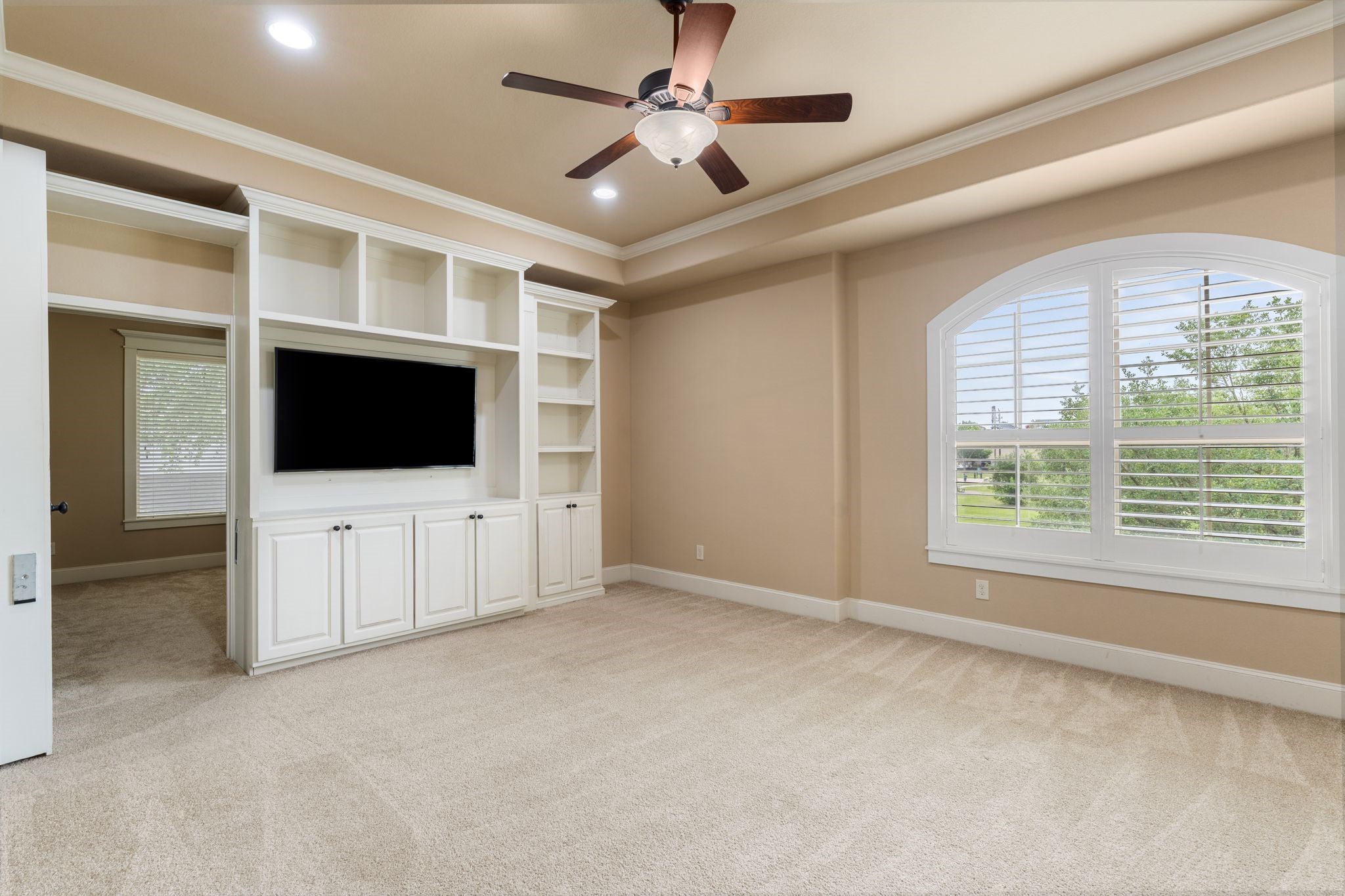 1418 Du Barry Lane Houston, TX 77018 - Photo 29 of 45 a living room with flat screen tv and white walls