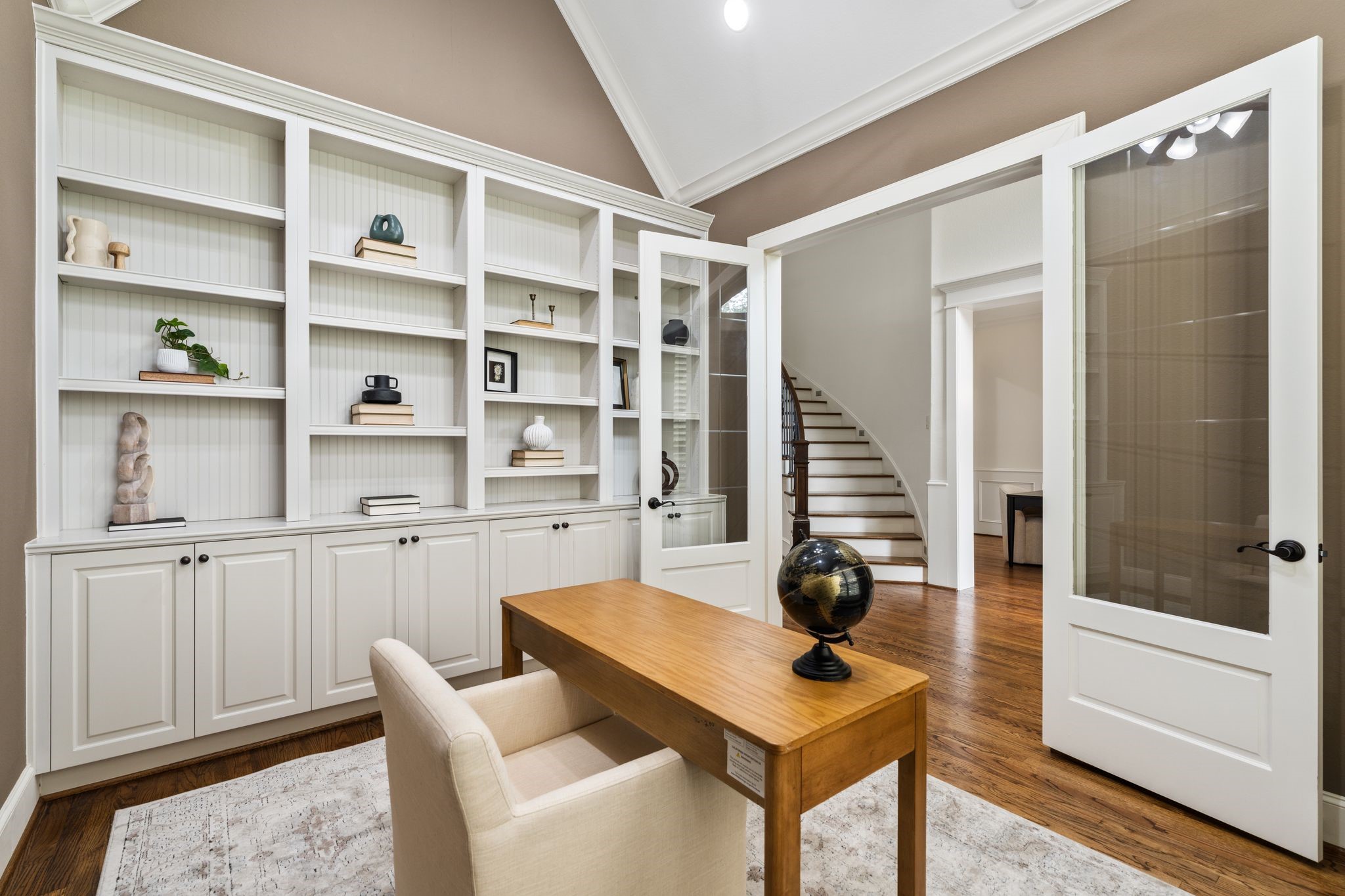 1418 Du Barry Lane Houston, TX 77018 - Photo 3 of 45 a view of a workspace with furniture and a window
