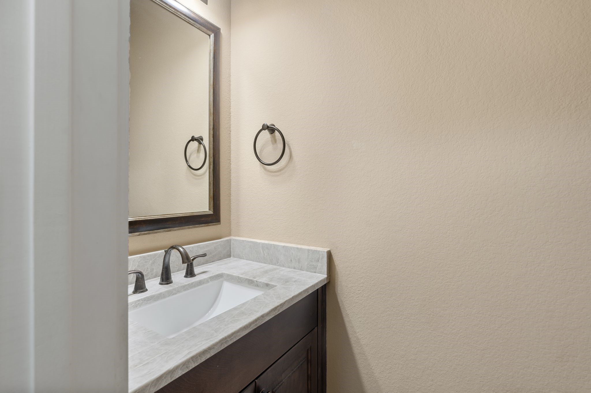 1418 Du Barry Lane Houston, TX 77018 - Photo 35 of 45 a bathroom with a sink and vanity