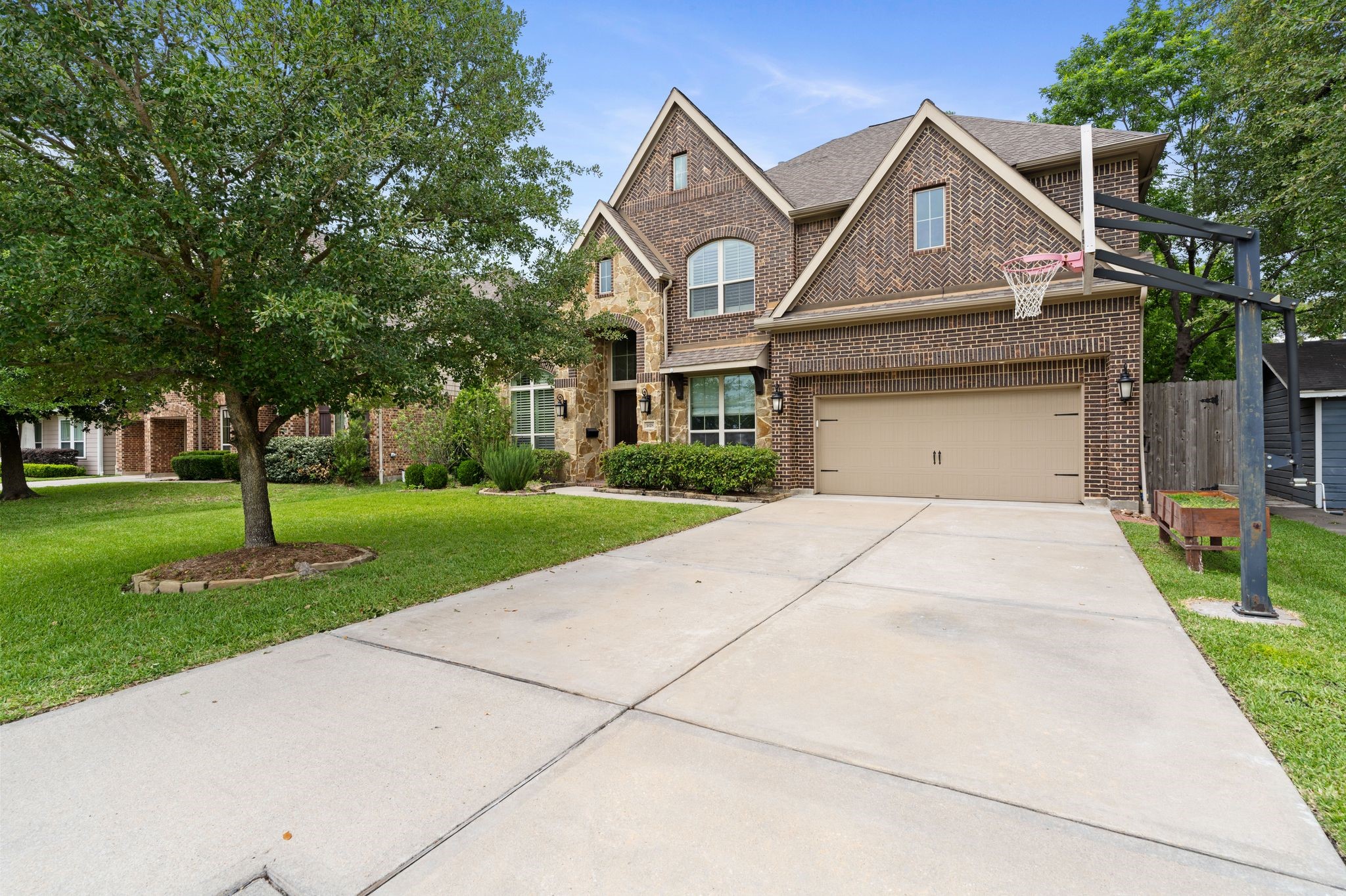 1418 Du Barry Lane Houston, TX 77018 - Photo 40 of 45 a front view of a house with a yard