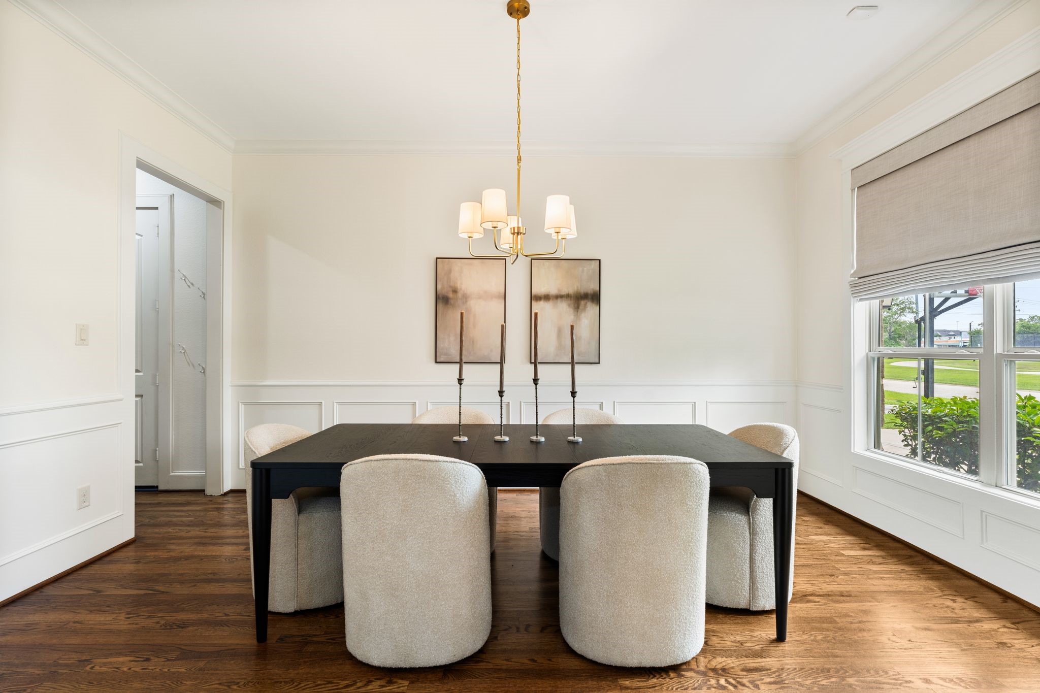 1418 Du Barry Lane Houston, TX 77018 - Photo 6 of 45 a dining room with chandelier and wooden floor
