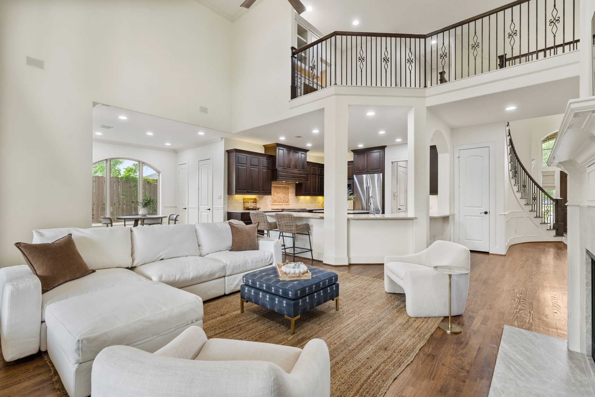1418 Du Barry Lane Houston, TX 77018 - Photo 7 of 45 a living room with furniture and a chandelier