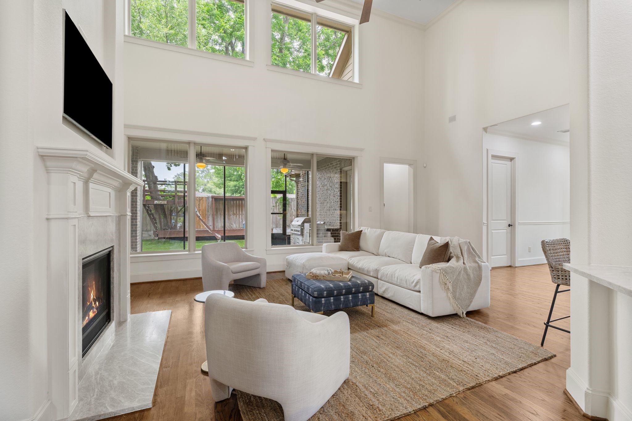 1418 Du Barry Lane Houston, TX 77018 - Photo 10 of 45 a living room with fireplace furniture and a flat screen tv