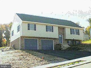 23 Valley Road Windsor, PA 17366 - Photo 1 of 1 a front view of a house with garden