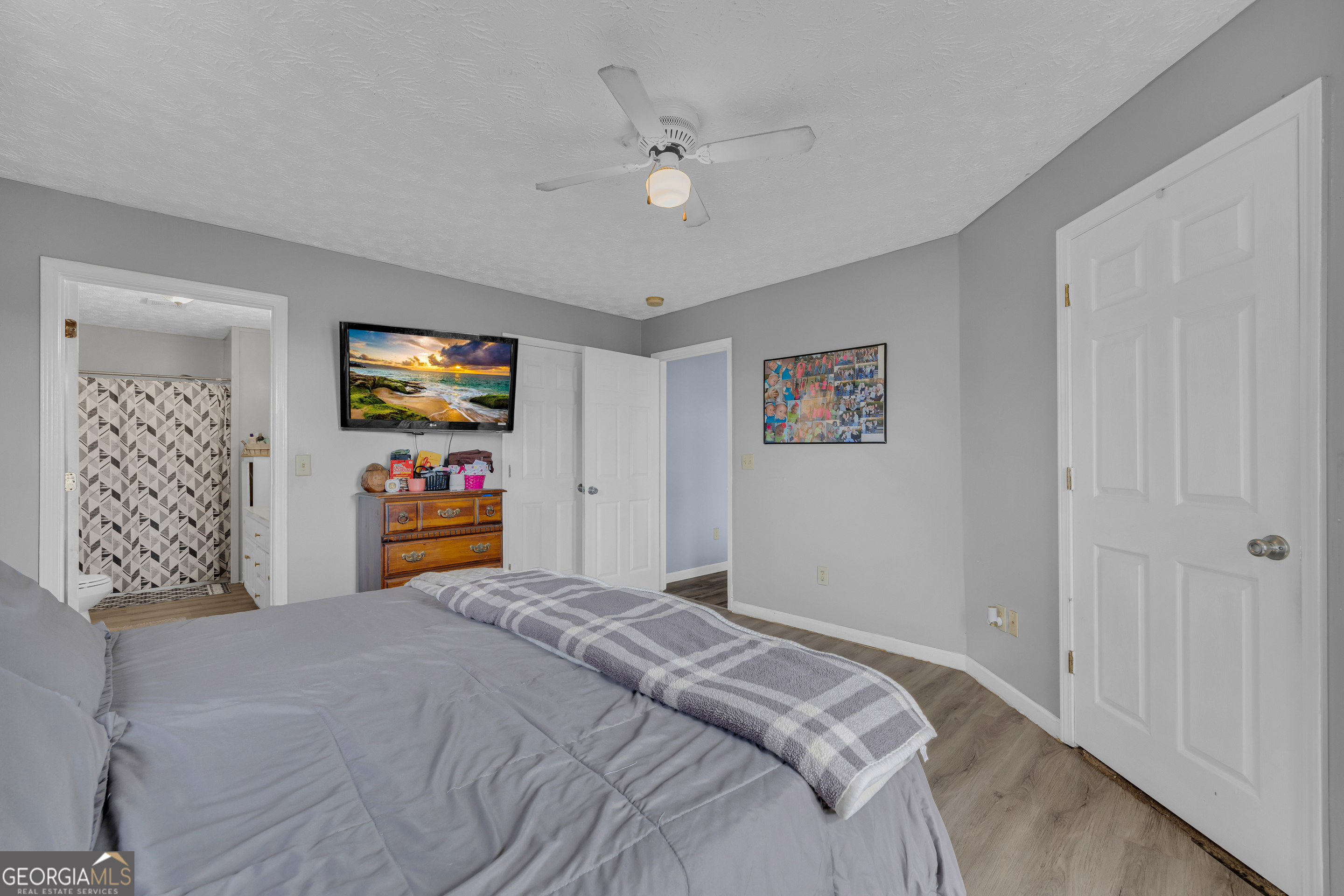 156 Shirley Road Royston, GA 30662 - Photo 12 of 29 a bedroom with a bed and a tv
