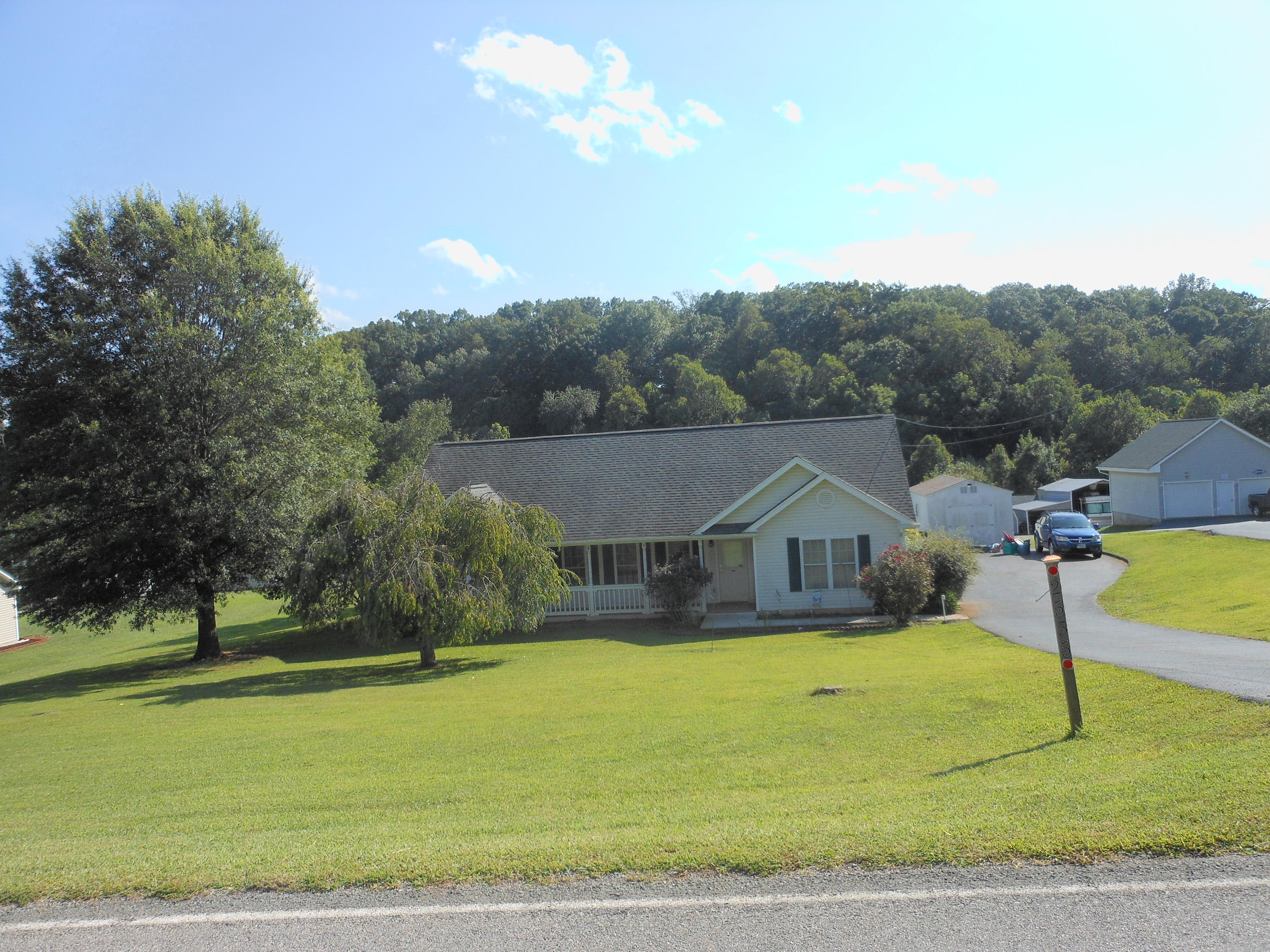 2535 Rutrough Road Southeast Roanoke, VA 24014 - Photo 1 of 1 a front view of a house with a yard