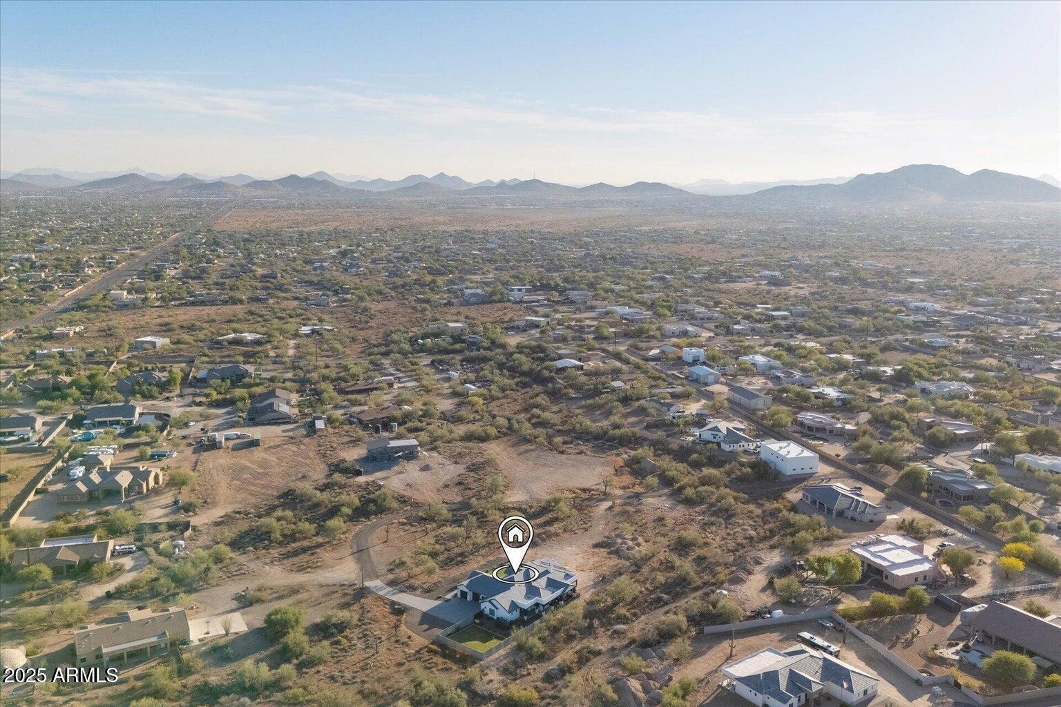 39720 North 7th Street Phoenix, AZ 85086 - Photo 3 of 11 a view of a mountain in the distance in a field