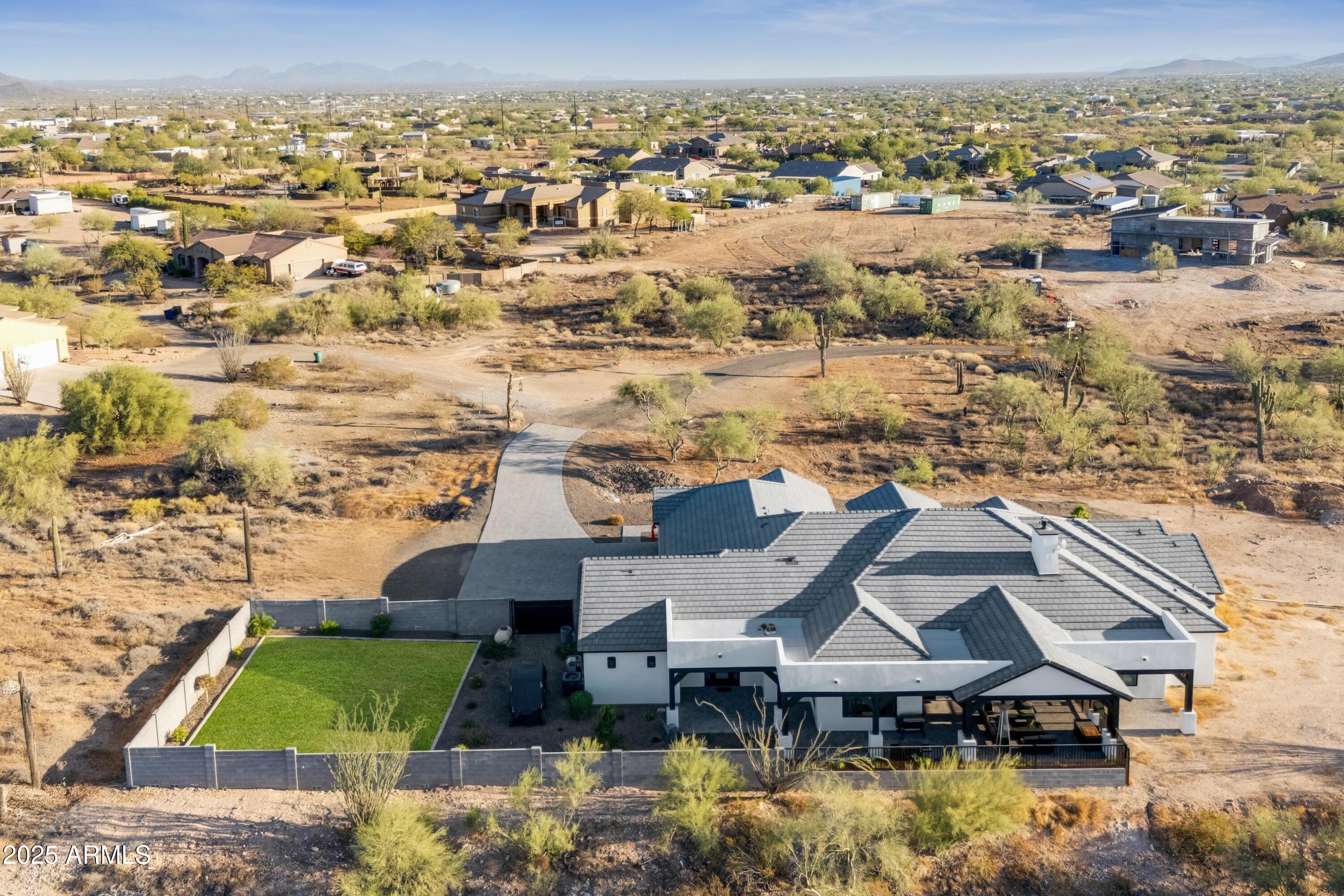 39720 North 7th Street Phoenix, AZ 85086 - Photo 5 of 11 an aerial view of residential houses with outdoor space and swimming pool