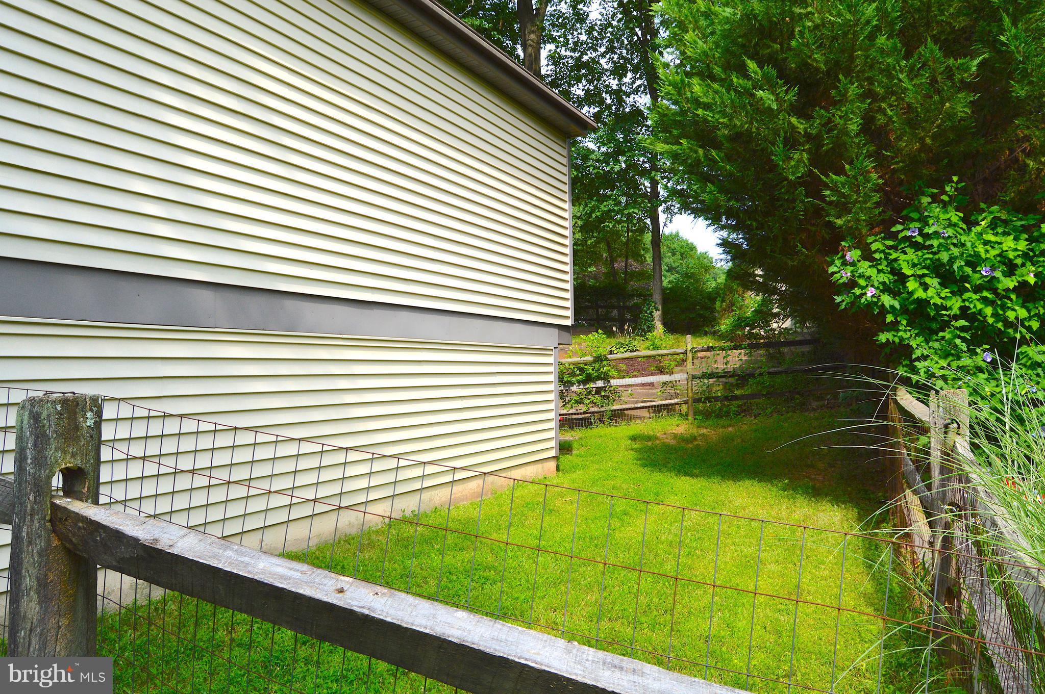 5918 Freds Oak Road Burke, VA 22015 - Photo 2 of 29 Side yard with private access to basement