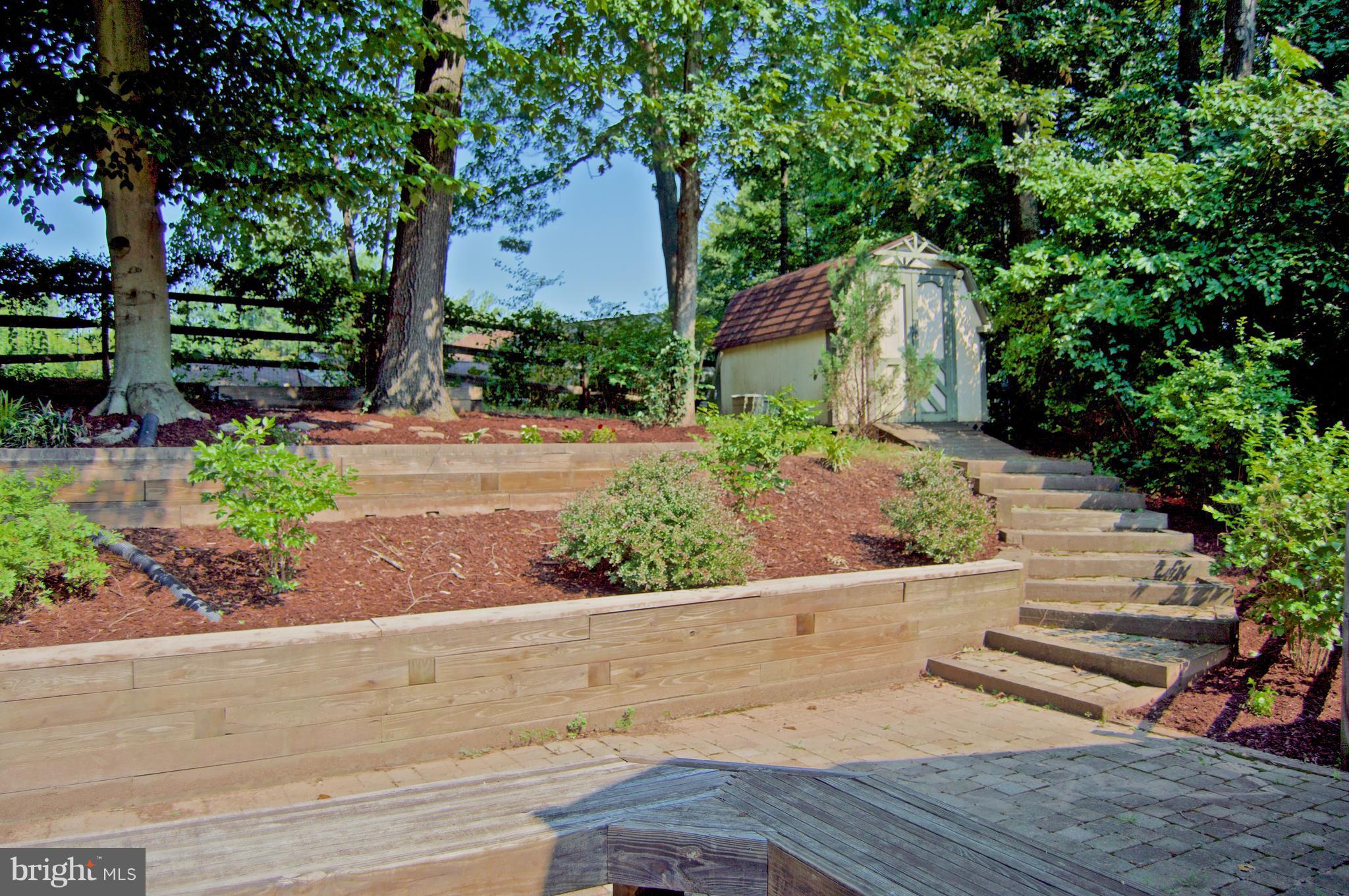 5918 Freds Oak Road Burke, VA 22015 - Photo 20 of 29 Anchored & Pressure-Treated Retaining wall