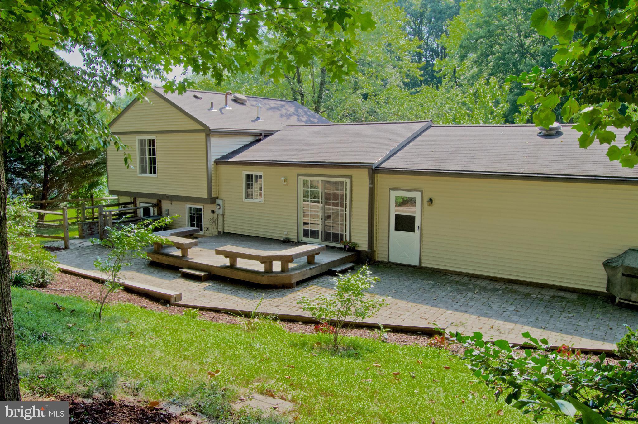 5918 Freds Oak Road Burke, VA 22015 - Photo 22 of 29 1,100 SqFt Brick Patio with Expansive Deck