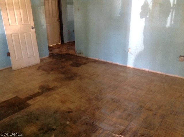 2022 Earl Road Fort Myers, FL 33901 - Photo 3 of 8 an empty room with windows