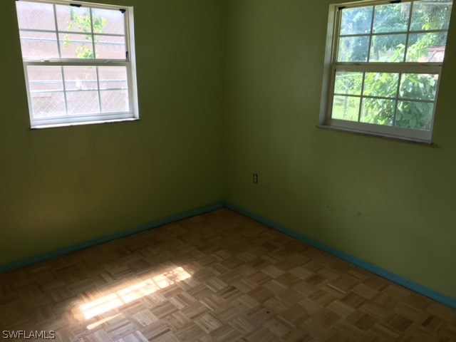 2022 Earl Road Fort Myers, FL 33901 - Photo 7 of 8 an empty room with a window