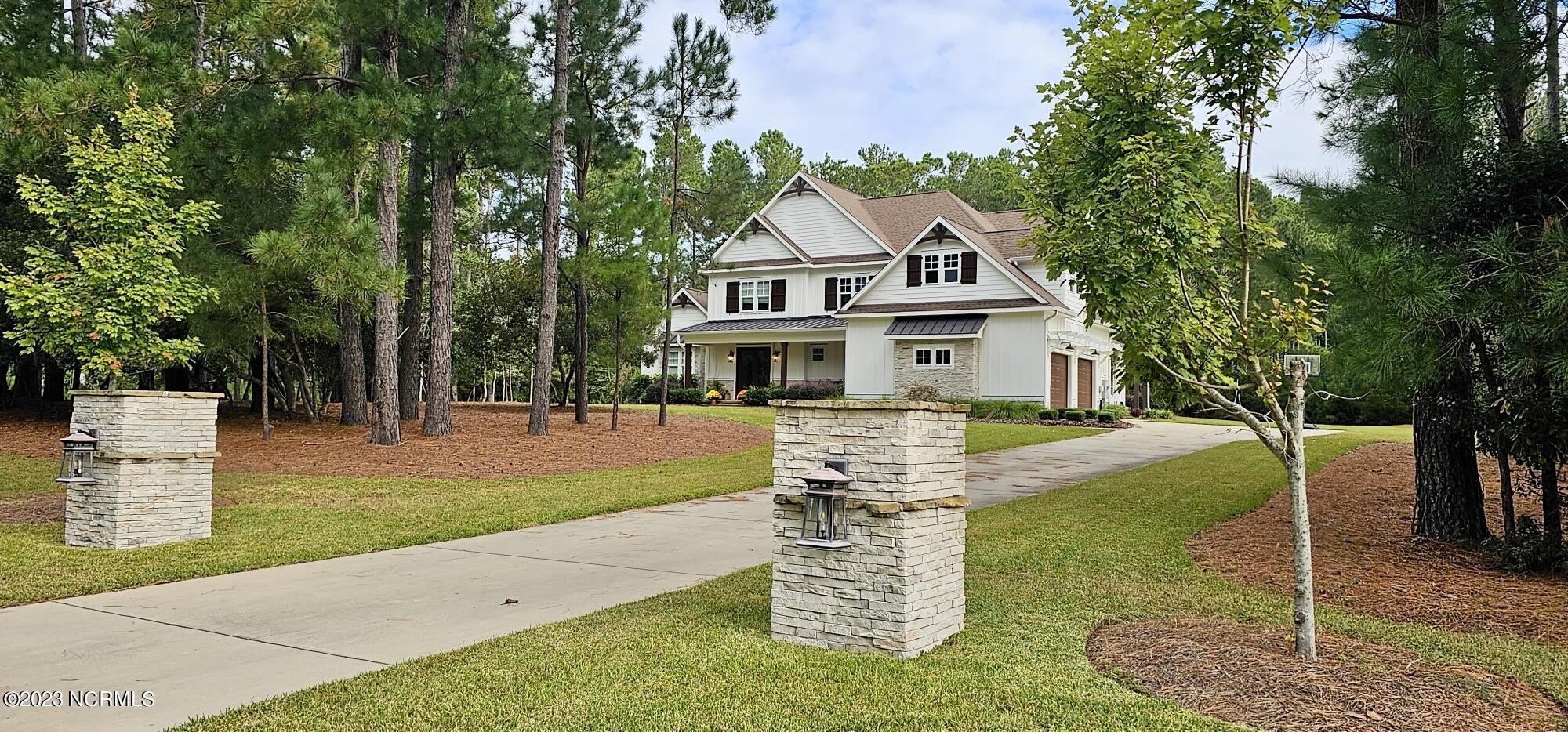 448 Whitebridge Road Hampstead, NC 28443 - Photo 1 of 139 Modern Farmhouse with Coastal Design and Rustic Charm